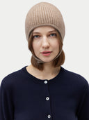 Unisex Cashmere Knitted Aviator Cap Taupe worn by model, detail view on white background #color_taupe