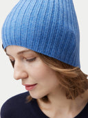 Unisex Cashmere Rib Knit Hat Blue worn by model, detail view on white background #color_blue