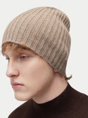 Unisex Organic Cashmere Rib Knit Hat Taupe worn by model, detail view on white background #color_taupe