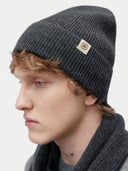 Unisex Cashmere Rib Knit Beanie Charcoal worn by model, detail view on white background #color_charcoal