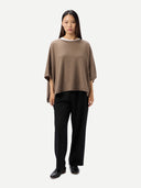 Women's Taupe Cashmere Knitted Poncho worn by model, front view, on white background #color_taupe