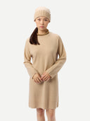 Women's Seamless Crewneck Cashmere Dress Beige worn by model detail view on white background #color_beige