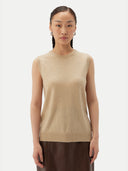 Women's Cashmere Crewneck Vest Beige worn by model, detail view on white backround #color_beige