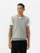 Men's Grey Cashmere Vest worn by model, detail view on white background #color_steel-silver
