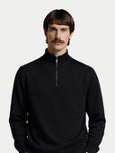 Men's Black Half-Zip Cashmere Sweater worn by model, detail view on white background #color_black #ai-image