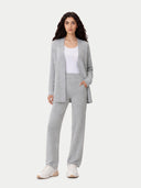 Women's Relaxed-Fit Cashmere Cardigan Grey worn by model, front view on white background #color_light-gray #ai-image