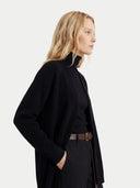 Women's Black Cashmere Open-Front Cardigan worn by model, side view on white background #color_black
