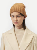 Unisex Cashmere Basic Beanie Almond worn by model, detail view on white background #color_golden-brown