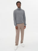 Men's Dim Gray Cashmere Turtleneck Sweater worn by model, front view on white background #color_gray