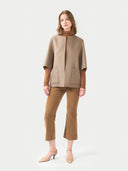 Women's Patch Pocket Cashmere Poncho Jacket Taupe worn by model front view on white background #color_taupe