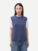 Ajour Knit Crewneck Cashmere Vest Crown Blue worn by model, detail view on white backround #color_soft-indigo