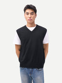 Timeless V-Neck Cashmere Vest Black worn by model, detail view, on white background #color_black