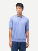 Men Classic Polo Shirt with Short Sleeve Cambray Blue worn by model, detail view on white background #color_chambray-blue