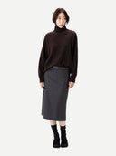 Unisex High-Neck Cashmere Sweater Mole worn by model, front view, on white background #color_deep-mole