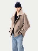 Women's Taupe Trench-Style Cashmere Peacoat worn by model, detail view on white background #color_taupe