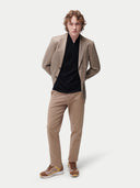 Men's Taupe single-breasted cashmere blazer worn by model front view on backround #color_taupe