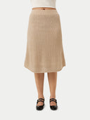 Beige knitted cashmere scarf on a light gray background #color_beige