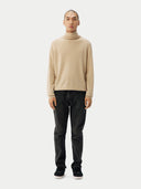 Men's Beige Cashmere Basic Turtle Neck Sweater Beige worn by model, front view on white background #color_beige