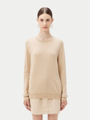 Women's Beige Cashmere Basic Crew Neck Sweater worn by model, detail view on white background #color_beige