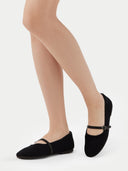 Pair of black flat shoes with a strap on a light gray background #color_black