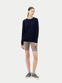Women's Navy Cashmere Crewneck Sweater worn by model, front view on white background #color_navy-blue