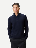 Men's Cashmere Waffle Knit Half-Zip Sweater Navy Blazer worn by model, detail view on white background #color_navy