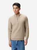 Men's Organic Colour Cashmere Waffle Knit Half-Zip Sweater Warm Grey worn by model, detail view on white background #color_dusty-beige