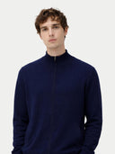 Men's Navy Full-Zip Cashmere Cardigan worn by model, detail view on white background #color_navy-blue #ai-image