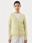Women's Tender Yellow Cashmere V-Neck Sweater worn by model, detail view on white background #color_cream-yellow