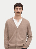 Men's Taupe Cashmere V-neck Cardigan worn by model, detail view on white background #color_taupe #ai-image