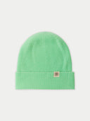 Green beanie with a brand logo on a light gray background #color_soft-green