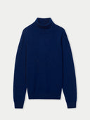 Men's Navy Turtleneck Cashmere Sweater detail view on white background #color_navy-blue