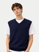 Timeless V-Neck Cashmere Vest Navy Blazer worn by model, detail view, on white background #color_navy #ai-image