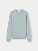 A light blue crewneck cashmere sweater by COBI, displayed flat against a light gray background. #color_cloud-blue
