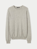 A light gray heather crewneck cashmere sweater with long sleeves and ribbed cuffs and hem, shown flat against a light gray background. #color_steel_silver