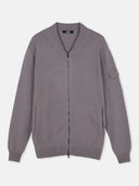 A gray knit zip-up cashmere bomber with a V-neck, ribbed cuffs and hem, and a sleeve pocket, shown against a light gray background. #color_cool-gray