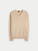 Beige v-neck sweater on a light beige background #color_beige