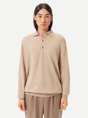 Men's Beige Cashmere Polo Sweater worn by model, detail view on white background #color_beige