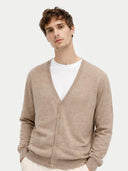 Man wearing a beige cardigan over a white shirt on a light grey background #color_taupe #ai-image