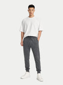 Men's Cashmere Jogger Plum Kitten worn by model, front view on white background #color_dark-gray #ai-image
