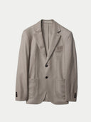 Men's Taupe single-breasted cashmere blazer detail view on backround #color_taupe