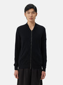 Black zip-up cashmere hoodie on a light gray background #color_black