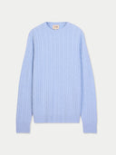 Light blue ribbed sweater on a light gray background #color_muted-blue