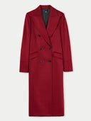 A red, double-breasted, peak lapel long cashmere coat with a V-neck collar and button details. #color_bordeaux