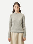 Women's Grey Cashmere Crew Neck Sweater worn by model, detail view on white background #color_steel-silver