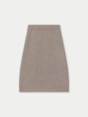 A taupe knit cashmere sweater skirt with a textured open-knit pattern, shown flat against a light gray background. #color_dusty-beige
