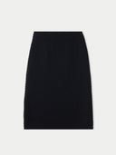 Black ribbed knit pencil cashmere skirt on a light gray background #color_black