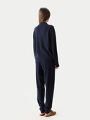 Timeless Cashmere Full-Zip Cardigan Navy Blazer worn by model, back view, on white background #color_navy