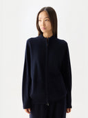 Timeless Cashmere Full-Zip Cardigan Navy Blazer worn by model, front view, on white background #color_navy