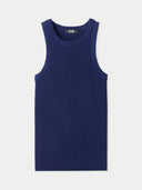 A sleeveless ribbed knit tank cashmere top in dark navy blue, shown flat against a light off-white background. #color_dark-indigo